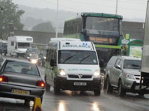 Ambulance on busy road